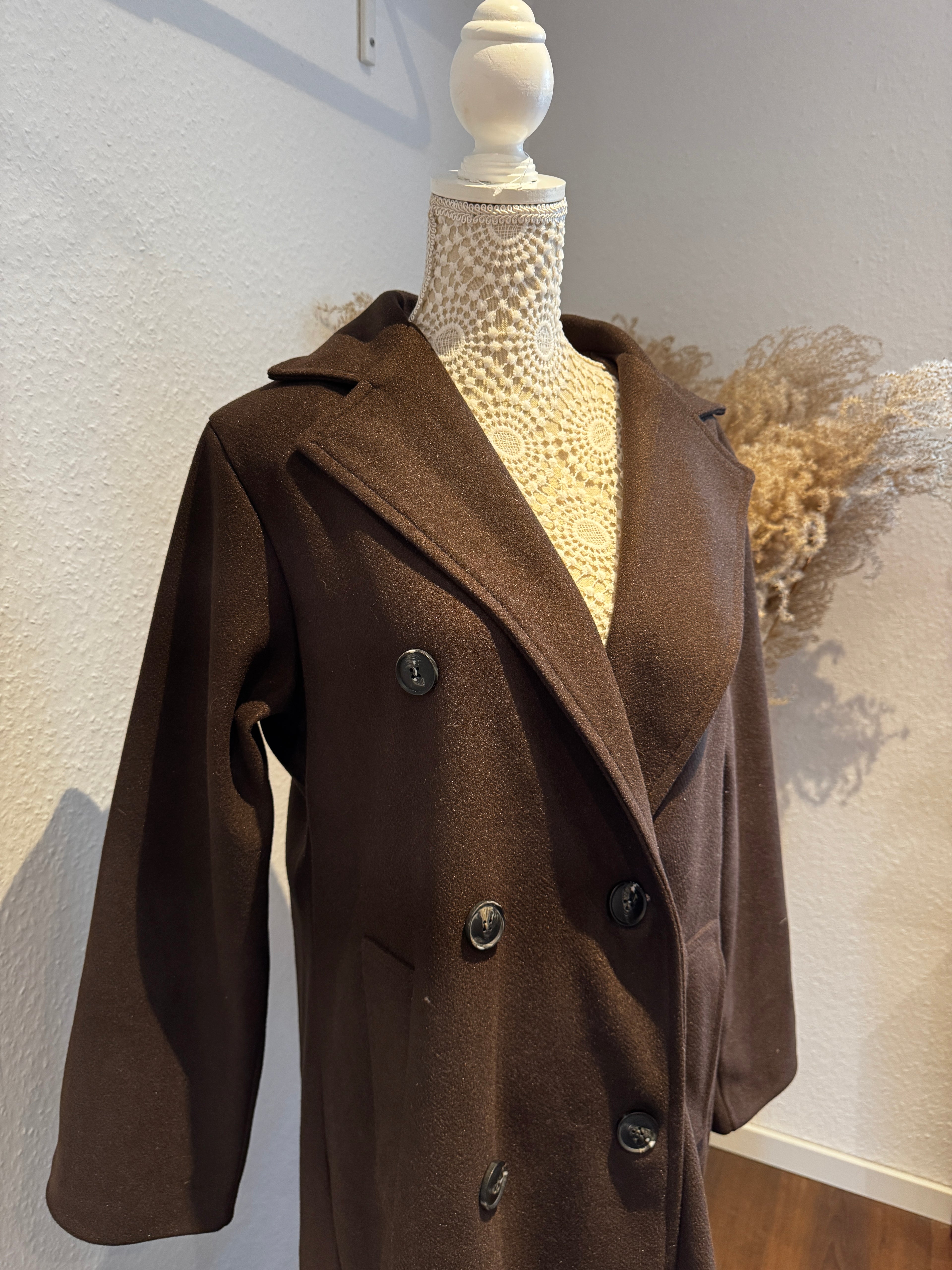 Eleganter Mantel mit doppelter Knopfreihe